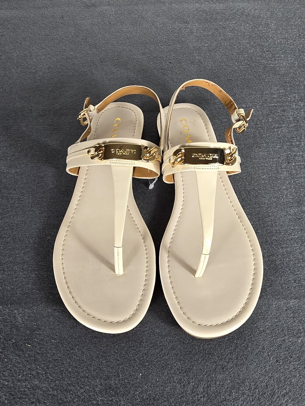 Coach Women's Cream Leather T-Strap Sandals with Gold Hardware